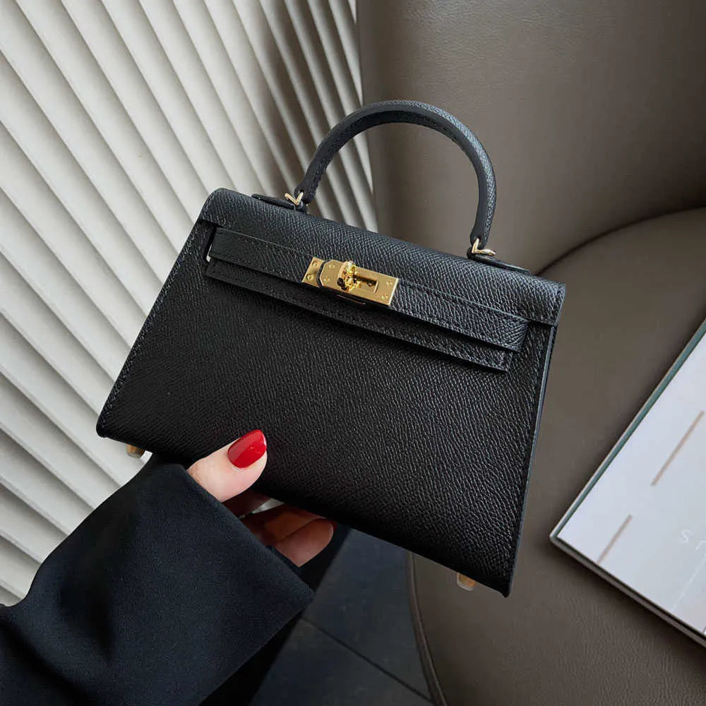 Chic Mini Cowhide Handbag - Compact Leather Style