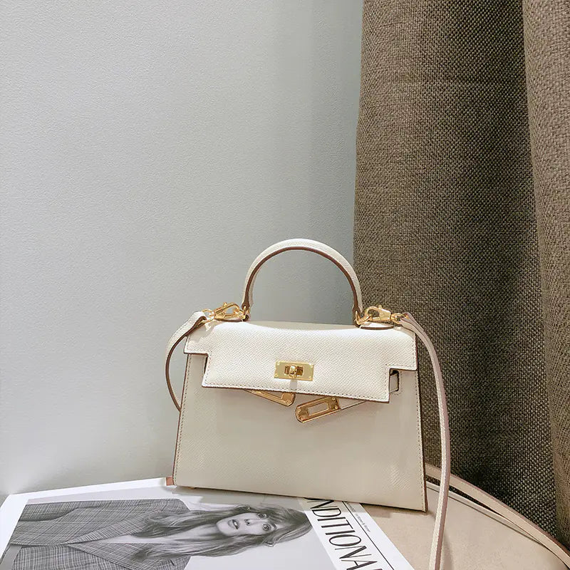 Chic Mini Cowhide Handbag - Compact Leather Style