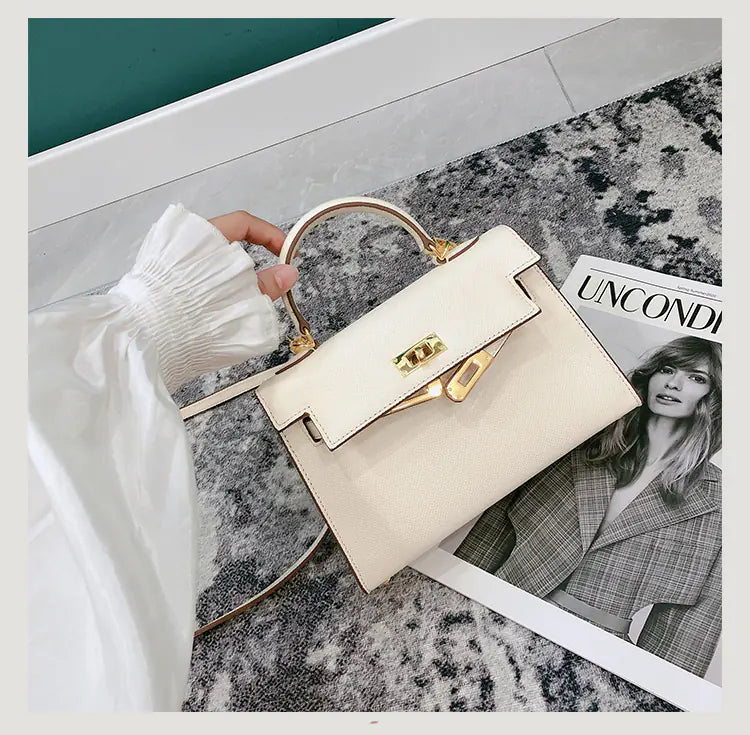 Chic Mini Cowhide Handbag - Compact Leather Style
